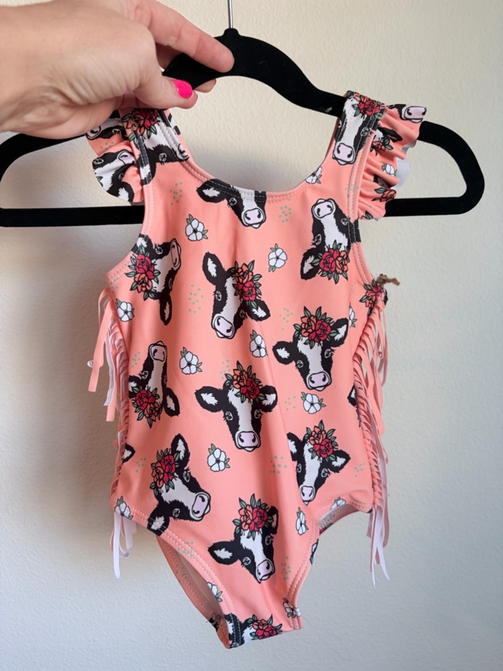 Girls Peach Cow Print One-Piece Swimsuit with Ruffle Straps.  Girls Large